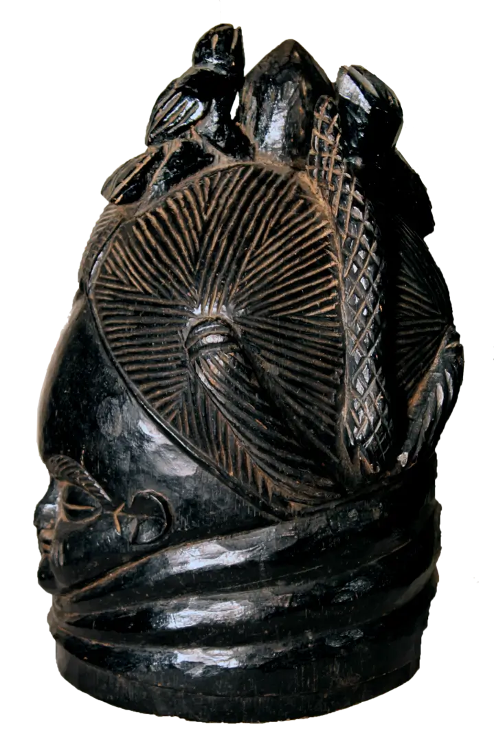 side view of the antique Mende Bundu mask